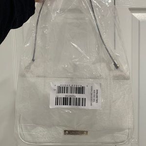 Aldo white purse with removable gold butterfly chain.